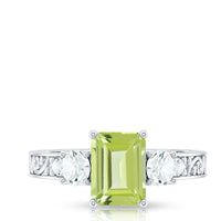 Vintage style 1.8 carat peridot emerald cut engagement ring with moissanite from Rosec Jewels, showcasing a sparkling green gemstone and elegant band.