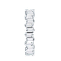 Rosec Jewels baguette shape moissanite eternity wedding band ring with sparkling stones in a continuous design.