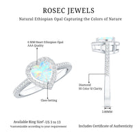 Heart-shaped Ethiopian opal engagement ring with diamond halo from Rosec Jewels, showcasing vibrant opal and sparkling diamond accents.