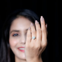 Heart-shaped Ethiopian opal engagement ring with diamond halo, featuring a rose gold band and intricate detailing.
