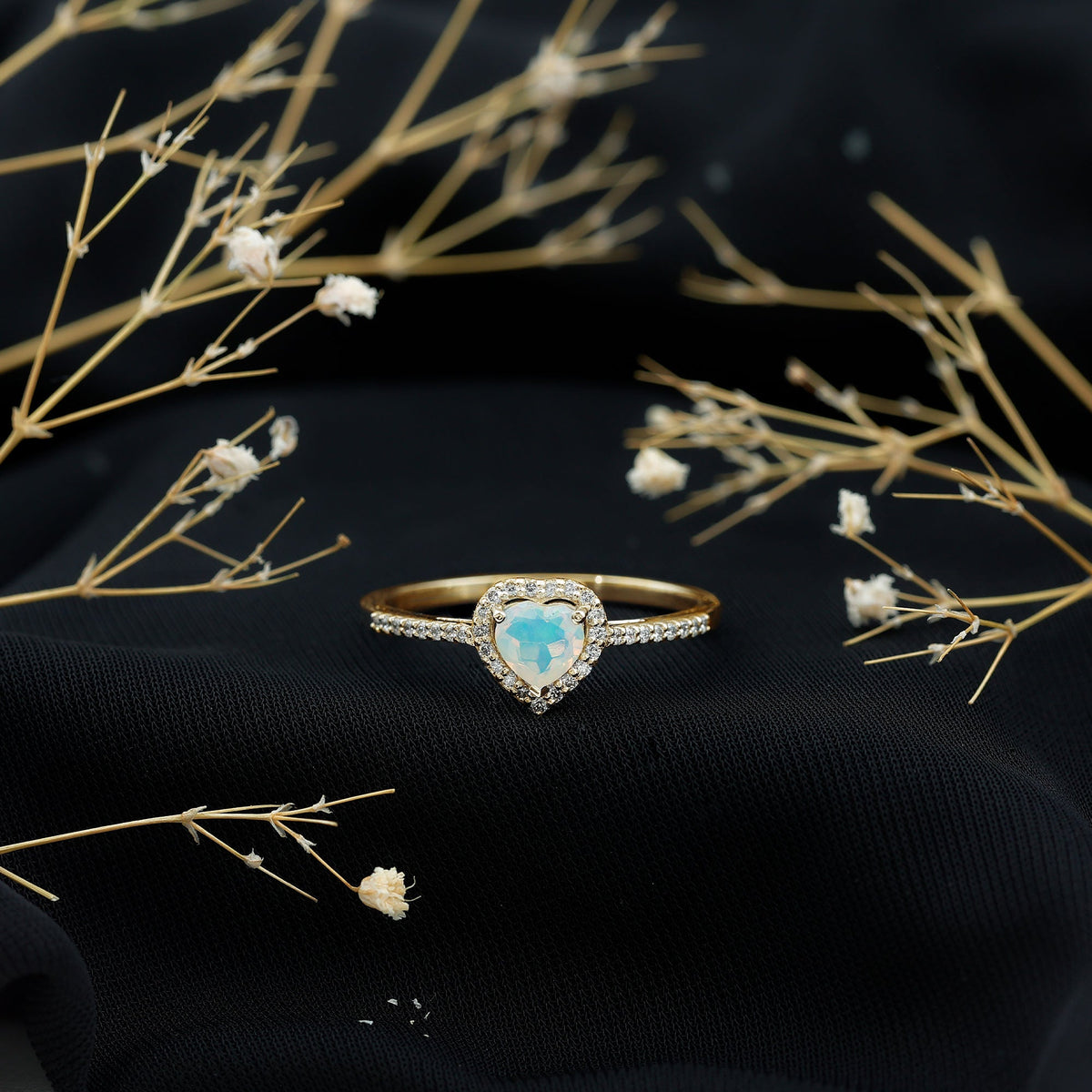 Natural Ethiopian opal heart-shaped engagement ring with diamond halo, showcasing elegant jewelry design by Rosec Jewels.