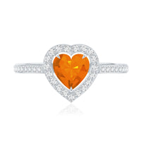 Heart-shaped fire opal engagement ring with diamond halo, 0.9 carats, from Rosec Jewels, showcasing the detailed design and sparkling stones.