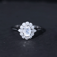 Natural 0.6 Carat Oval Shape Moonstone Engagement Ring With Moissanite