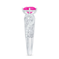 Lab grown pink sapphire antique engagement ring with diamond accents, featuring intricate vintage design and rose gold finish.