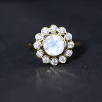 Round Moonstone and Diamond Halo Engagement Ring in Bezel Setting