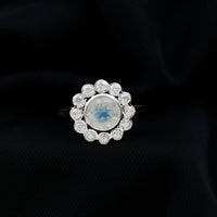 Round Moonstone and Diamond Halo Engagement Ring in Bezel Setting