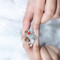 Flower-inspired fire opal engagement ring with diamond accents from Rosec Jewels featuring vibrant orange and floral design.