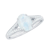 Oval cut moonstone solitaire engagement ring with diamond accents, featuring a 3/4 carat center stone, by Rosec Jewels.
