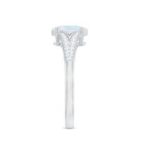 Oval cut moonstone solitaire engagement ring with diamond accents, featuring a 3/4 ct central gemstone and elegant band.