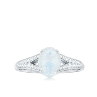 Oval cut moonstone solitaire engagement ring with diamond accents in a 3/4 carat size, crafted by Rosec Jewels.