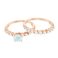 Pair of natural Ethiopian opal diamond wedding engagement rings set from Rosec Jewels featuring sparkling gemstone accents.