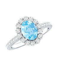 Oval 1-carat aquamarine halo engagement ring by Rosec Jewels with certificate, featuring a silver band and intricate halo design.