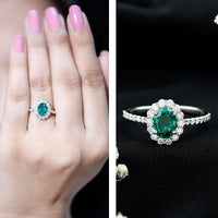Oval lab-grown emerald halo engagement ring by Rosec Jewels with 1.2 carats, featuring a sparkling gemstone and elegant band.