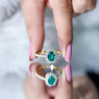 Certified 1.2 carat oval lab-grown emerald halo engagement ring by Rosec Jewels, featuring a stunning central emerald with a halo design.