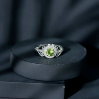 Vintage Inspired 0.5 Carat Peridot Engagement Ring with Diamond Halo