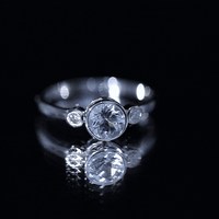 Bezel set real aquamarine and diamond engagement ring by Rosec Jewels featuring yellow gold band and certificate.