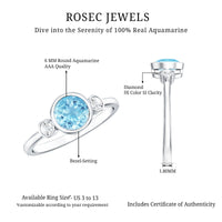 Bezel set aquamarine and diamond engagement ring by Rosec Jewels with certificate, featuring a central aquamarine gemstone and sparkling diamonds.