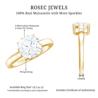Certified 8mm cushion cut moissanite solitaire engagement ring featuring a sparkling central stone and a sleek band.
