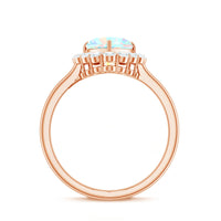 Heart-shaped Ethiopian opal engagement ring with diamond halo by Rosec Jewels, featuring a vibrant orange and green gemstone setting.