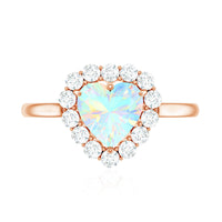 Heart-shaped Ethiopian opal engagement ring with diamond halo from Rosec Jewels, featuring a vibrant, colorful gemstone and sparkling accents.