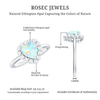Heart-shaped Ethiopian opal engagement ring with diamond halo, featuring a Rosec Jewels ring setting and intricate gemstone details.