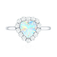 Heart-shaped Ethiopian opal engagement ring with diamond halo from Rosec Jewels, showcasing a sparkling gemstone and elegant design.