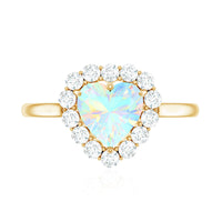Heart-shaped engagement ring with certified Ethiopian opal and diamond halo by Rosec Jewels, featuring a detailed gold band.