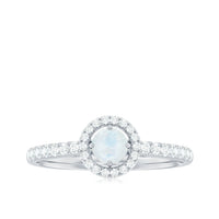 0.75 CT moonstone and diamond halo engagement ring by Rosec Jewels featuring a central moonstone with a sparkling diamond halo.