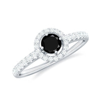 Minimal black spinel engagement ring with diamond halo from Rosec Jewels, showcasing the sleek black band and sparkling halo setting.