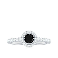 Minimal black spinel engagement ring with diamond halo, featuring a sleek black band and sparkling halo setting from Rosec Jewels.