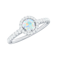 Natural Ethiopian opal diamond engagement ring with halo setting, featuring a stunning central opal and sparkling diamonds by Rosec Jewels