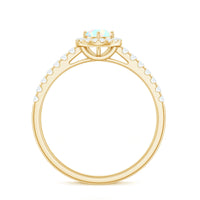 Natural Ethiopian opal diamond engagement ring with halo setting, showcasing a vibrant opal center stone and sparkling diamonds.