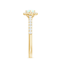 Natural Ethiopian opal diamond engagement ring with halo setting from Rosec Jewels, showcasing a vibrant opal centerpiece and sparkling diamonds.