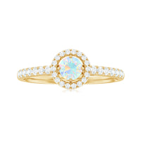 Natural Ethiopian opal diamond engagement ring with halo setting, featuring a central opal gemstone and sparkling diamonds from Rosec Jewels.