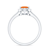 Teardrop fire opal ring with diamond accent by Rosec Jewels, showcasing the elegant gemstone and sparkling details.