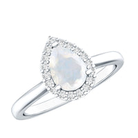 Pear-shaped moonstone halo engagement ring with diamond accents, featuring Rosec Jewels' elegant ring design.
