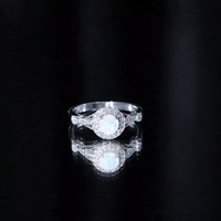 Genuine Ethiopian Opal antique-looking engagement ring with diamond halo, featuring intricate design and rose gold finish.