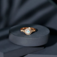 Genuine Ethiopian Opal engagement ring with antique style and diamond halo, crafted by Rosec Jewels.