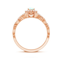 Vintage-style Ethiopian opal and diamond engagement ring with a criss-cross shank, crafted by Rosec Jewels.