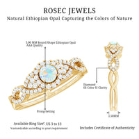 Vintage-style engagement ring by Rosec Jewels featuring a real Ethiopian opal, diamonds, and a criss-cross shank design.