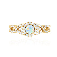 Vintage-style engagement ring with real Ethiopian opal and diamond accents featuring a criss-cross shank by Rosec Jewels.