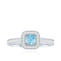 Vintage aquamarine and diamond halo engagement ring for women featuring Rosec Jewels design, with intricate metalwork and gemstone details.