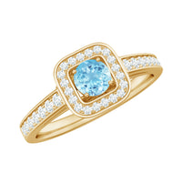 Vintage-style aquamarine and diamond halo engagement ring for women by Rosec Jewels, showcasing a detailed jewelry design.