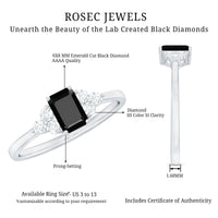 Emerald cut created black diamond solitaire ring with diamond trio accents, crafted by Rosec Jewels in elegant jewelry style