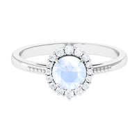 3/4 carat natural moonstone engagement ring with diamond accents from Rosec Jewels, showcasing a shimmering moonstone and delicate band.