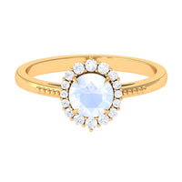 3/4 ct natural moonstone engagement ring by Rosec Jewels featuring a diamond accent and a delicate band.