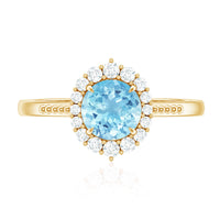 Natural 6mm aquamarine halo engagement ring with diamonds by Rosec Jewels, featuring a central aquamarine gemstone and diamond accents.