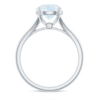 Natural moonstone solitaire ring with a surprise diamond accent, showcasing elegant jewelry design by Rosec Jewels.