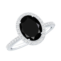 Lab grown black and white diamond oval engagement ring with halo, crafted by Rosec Jewels, featuring sparkling stones and intricate design.