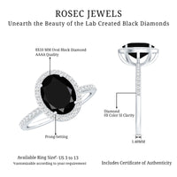 Lab grown black and white diamond oval engagement ring with halo by Rosec Jewels, showcasing intricate design and sparkling stones.